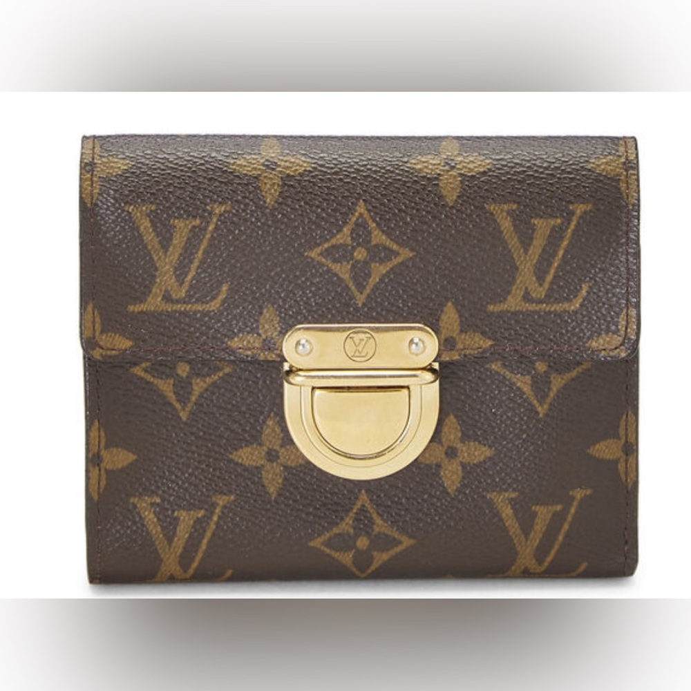 Authentic Louis Vuitton women’s Koala wallet.